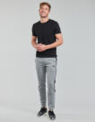 Pantalones Deportivos Puma EVOSTRIPE CORE FZ PANT Gris Pantalones Deportivos Hombre - 2