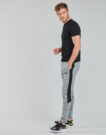 Pantalones Deportivos Puma EVOSTRIPE CORE FZ PANT Gris Pantalones Deportivos Hombre - 3