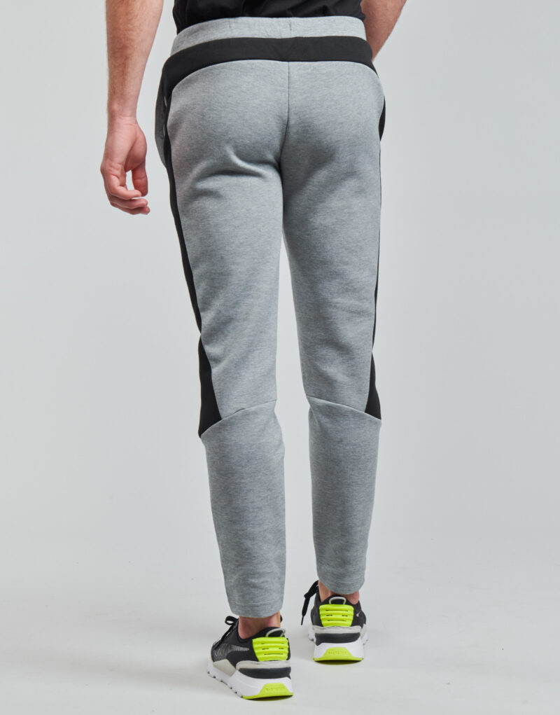 Pantalones Deportivos Puma EVOSTRIPE CORE FZ PANT Gris Pantalones Deportivos Hombre - 4