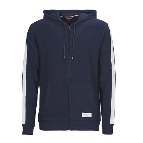 Felpa uomo Tommy Hilfiger HWK FZ HOODIE in colore marine, dotata di cappuccio e chiusura zip, ideale per un look casual e alla moda. Comoda e versatile, perfetta per ogni occasione. Acquista la felpa Tommy Hilfiger HWK FZ HOODIE marine per elevate prestazioni di stile e comfort.