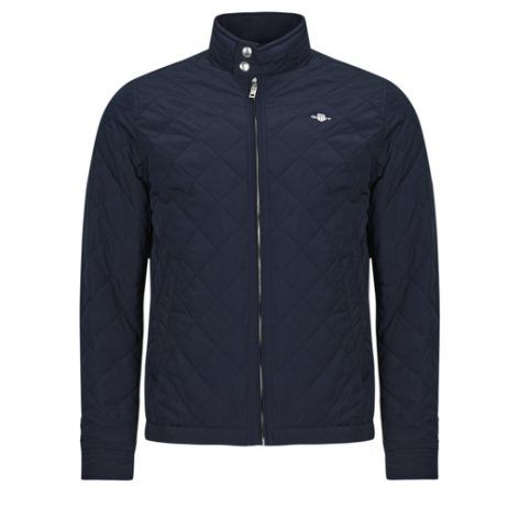 Giubbotto Gant QUILTED WINDCHEATER Marine per uomo, ideale per un look elegante e funzionale. Realizzato in materiale di alta qualità, offre calore e protezione dal vento. Perfetto per outfit casual e outdoor, è un must-have per l'inverno. Scopri il comfort e lo stile dei giubbotti uomo Gant.