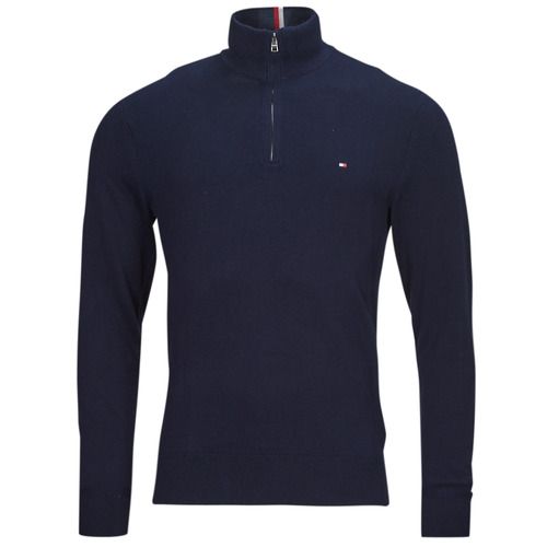 Maglione Uomo Tommy Hilfiger PIMA ORG CTN CASHMERE ZIP MOCK Marine, elegante e confortevole, realizzato in morbido cotone e cashmere, ideale per un look casual e sofisticato. Perfetto per le stagioni fredde, questo maglione presenta una chiusura con zip e un design raffinato, garantendo calore e stile. Disponibile in colore marine, un must-have per ogni guardaroba maschile.
