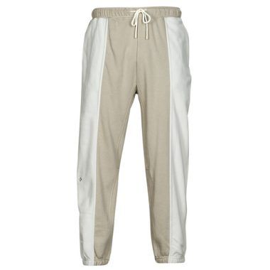 Pantalone Cargo Uomo Converse ELEVATED SEASONAL KNIT PANT Beige, ideale per uno stile casual e alla moda. Realizzato con materiali di alta qualità, questo pantalone offre comfort e versatilità per ogni occasione. Scopri il design moderno e i dettagli pratici, perfetti per l'uso quotidiano. Acquista ora il tuo paio di pantaloni cargo Converse per un look trendy e funzionale.