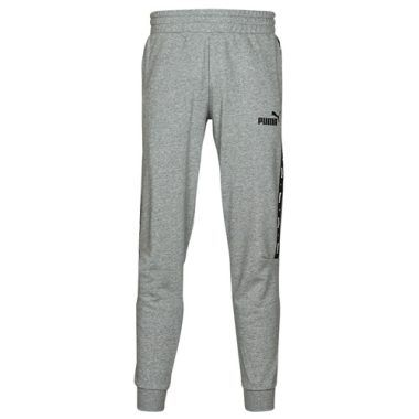 Pantaloni sportivi uomo Puma ESS TAPE SWEATPANT in grigio, design moderno e comfort elevato, ideali per attività sportive e tempo libero. Realizzati con materiali di alta qualità, offrono una vestibilità comoda e stilosa. Perfetti per il look athleisure, questi pantaloni Puma sono un must-have nel tuo guardaroba.