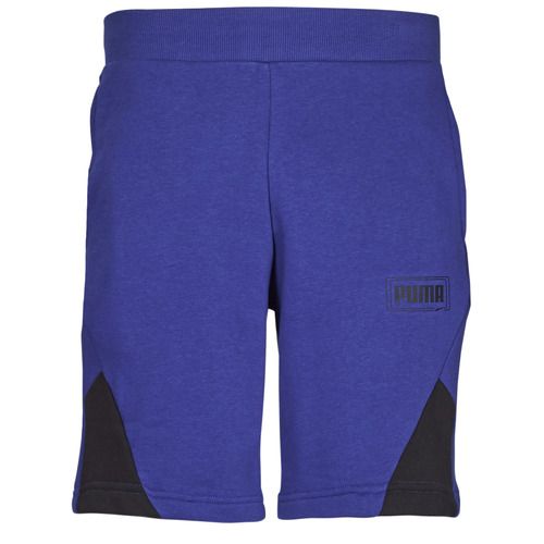 Pantaloni corti Uomo Puma RBL SHORTS Blu, ideali per l'abbigliamento sportivo e casual. Realizzati con materiali di alta qualità per garantire comfort e traspirabilità. Perfetti per attività all'aperto, palestra o tempo libero. Scegli lo stile e la funzionalità con questi pantaloni Puma.