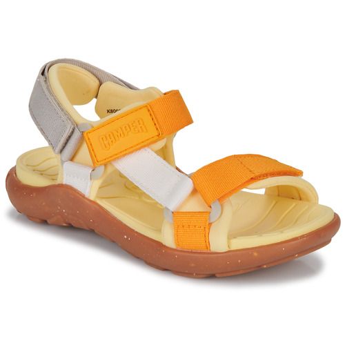 Sandali Camper per bambina ragazza modello OUSW in vivace color giallo, ideali per la stagione estiva. Questi sandali, comodi e alla moda, offrono supporto e stabilità per i piedi delle più piccole. Perfetti per completare qualsiasi outfit estivo, garantendo comfort e stile in ogni occasione. Acquista ora i tuoi Camper Sandali OUSW gialli per far felice la tua bambina!