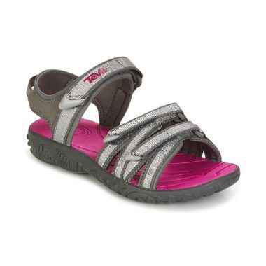Sandali Teva per bambina ragazza modello TIRRA in argento, ideali per l'estate. Design moderno e confortevole, perfetti per avventure all'aperto. Acquista ora i sandali Teva TIRRA Argento per il massimo stile e comodità!