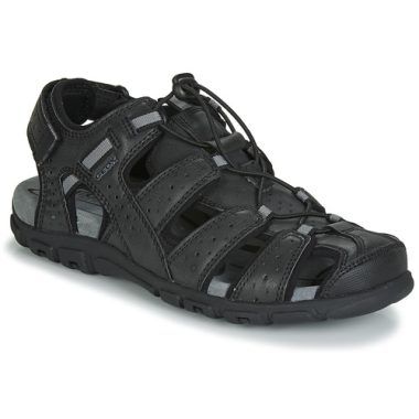 Sandali uomo Geox UOMO SANDAL STRADA in color nero, eleganti e confortevoli, ideali per l'estate. Questi sandali sono perfetti per ogni occasione, offrendo supporto e stile. Acquista i migliori sandali uomo Geox per un look alla moda e un comfort senza pari.
