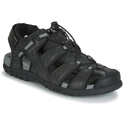 Sandali uomo Geox UOMO SANDAL STRADA in color nero, eleganti e confortevoli, ideali per l'estate. Questi sandali sono perfetti per ogni occasione, offrendo supporto e stile. Acquista i migliori sandali uomo Geox per un look alla moda e un comfort senza pari.