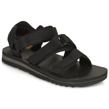 Sandali Uomo Teva M Cross Strap Trail BLACK in Nero, ideali per avventure all'aperto. Design ergonomico con cinturini incrociati per una vestibilità sicura e comfort ottimale. Perfetti per escursionismo, trekking e uso quotidiano. Acquista ora per un passo confortevole e alla moda!