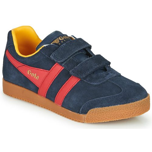 Scarpe Gola HARRIER VELCRO Blu per bambina ragazza, ideali per comodità e stile. Queste scarpe sportive in blu sono perfette per le attività quotidiane, garantendo il massimo supporto e una vestibilità sicura grazie alla chiusura in velcro. Acquista ora le Gola Scarpe bambina HARRIER VELCRO per un look trendy e alla moda!