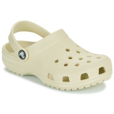 Scarpe bambino ragazzo Crocs Classic Clog K Beige, comode e versatili, perfette per ogni occasione. Materiale di alta qualità, facilità di indossamento e design moderno. Ideali per l'estate e le attività all'aperto. Acquista ora le Crocs Classic Clog K Beige per il tuo bambino!