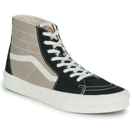 Sneakers alte uomo Vans SK8-HI TAPERED in colore Nero, modello iconico perfetto per un look casual e alla moda. Queste scarpe offrono comfort e stile, ideali per ogni occasione. Acquista ora le Vans SK8-HI TAPERED Nero per un'ottima combinazione di qualità e design.