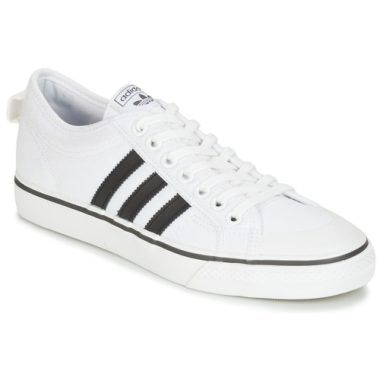 Sneakers uomo adidas NIZZA Bianco, stile versatile e comodo, perfette per outfit casual. Design elegante con dettagli iconici adidas, ideali per ogni occasione. Acquista le adidas NIZZA e trasforma il tuo look!