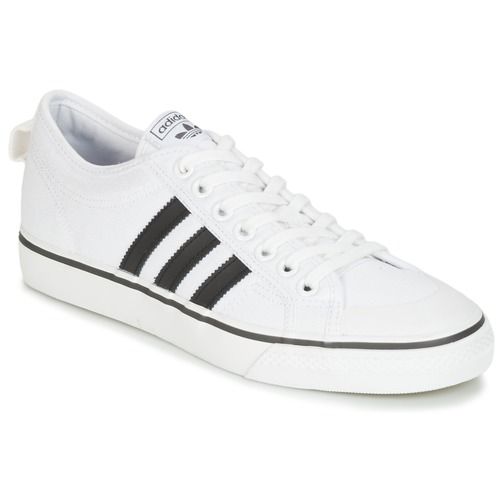 Sneakers uomo adidas NIZZA Bianco, stile versatile e comodo, perfette per outfit casual. Design elegante con dettagli iconici adidas, ideali per ogni occasione. Acquista le adidas NIZZA e trasforma il tuo look!