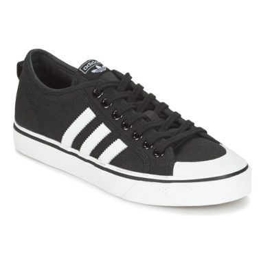 Sneakers uomo adidas NIZZA Nero, in stile casual e sportivo, con design elegante e confortevole. Scarpe versatili adatte per il tempo libero e l'abbigliamento quotidiano, perfette per completare il tuo look. Acquista ora le adidas NIZZA Nero per un comfort e uno stile imbattibili.