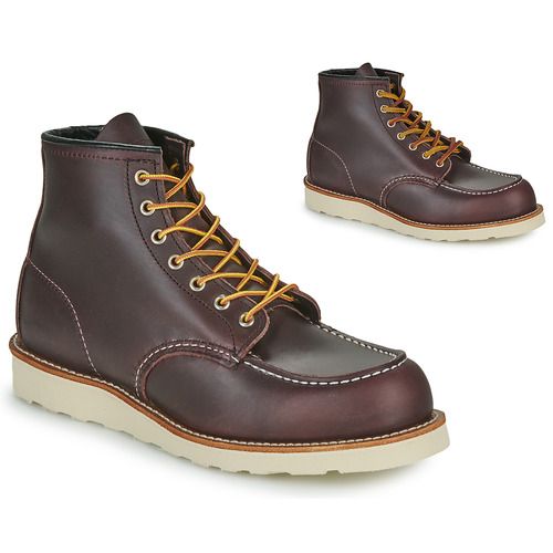 Stivaletti Uomo Red Wing MOC TOE Marrone in pelle resistente, con design classico e suola in gomma per maggiore comfort. Perfetti per ogni occasione, ideali per chi cerca stile e durabilità. Acquista ora i Red Wing MOC TOE Marrone per un look maschile intramontabile.