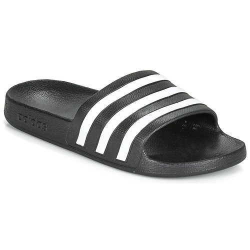 Ciabatte uomo adidas ADILETTE AQUA Nero, comfort e stile per l'estate. Perfette per il mare e la vita quotidiana, queste ciabatte offrono un design elegante e una calzata comoda. Ideali per chi cerca qualità e praticità nei sandali estivi. Disponibili in colore nero, sono un must-have nel tuo guardaroba estivo. Acquista ora le ciabatte adidas ADILETTE AQUA e goditi ogni passo.