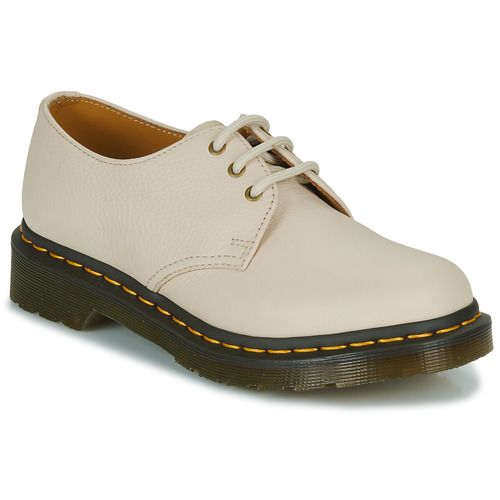 Scarpa Derby da donna Dr. Martens 1461 PARCHMENT BEIGE VIRGINIA in beige, caratterizzata da un design elegante e resistente. Realizzata in pelle di alta qualità, ideale per look casual e chic. Perfetta per ogni occasione, un must-have per il tuo guardaroba. Acquista ora per un comfort e uno stile senza tempo!