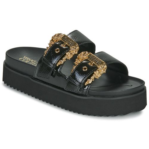 Sandali donna Versace Jeans Couture 74VA3SM1 in nero, eleganti e trendy, perfetti per ogni occasione. Realizzati con materiali di alta qualità, questi sandali offrono un comfort eccezionale e uno stile distintivo. Aggiungi un tocco di classe al tuo outfit estivo con questi sandali Versace, ideali per il tempo libero e le occasioni speciali. Disponibili online per un acquisto facile e veloce.