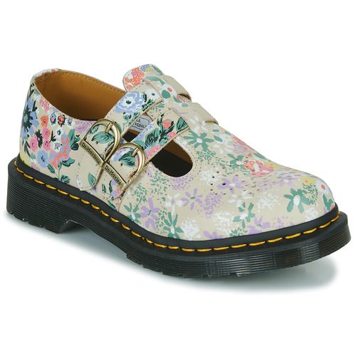 Scarpe Dr. Martens MARY JANE FLORAL MASH UP Beige Derby Donna in primo piano, caratterizzate da un design elegante e floreale. Realizzate con materiali di alta qualità, queste scarpe offrono comfort e stile, perfette per ogni occasione. Ideali per chi cerca un look trendy e versatile, queste Mary Jane sono un must-have per la primavera e l'estate. Disponibili in beige, si abbinano facilmente a diversi outfit. Acquista ora il tuo paio di Dr. Martens MARY JANE FLORAL MASH UP e aggiungi un tocco di classe al tuo guardaroba.