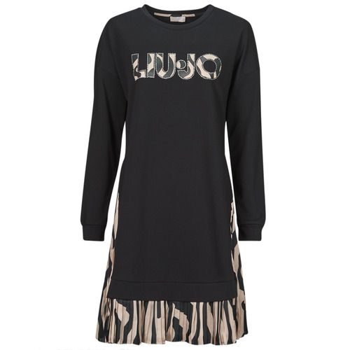 Abito lungo Liu Jo WA4094 in nero per donna, elegante e alla moda, perfetto per occasioni speciali e serate estive. Scegli la raffinatezza e lo stile senza tempo di questo abito lungo, ideale per valorizzare la figura femminile con un design chic e versatile. Acquista ora per un look sofisticato e di tendenza.