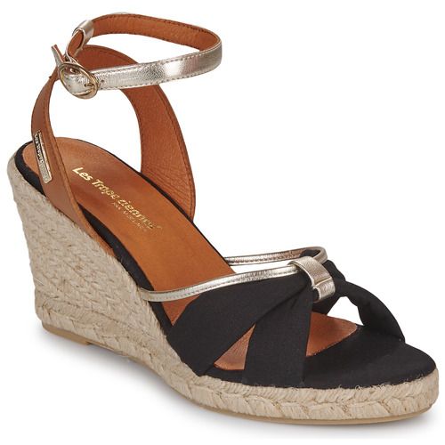 Espadrillas donne Les Tropéziennes par M Belarbi modello BLONDEL in colore nero, perfette per look estivi e casual. Realizzate con materiali di alta qualità per garantire comfort e stile. Ideali per ogni occasione, dalle passeggiate in città alle serate estive. Acquista ora le tue espadrillas nere BLONDEL per un tocco di eleganza nel tuo guardaroba.