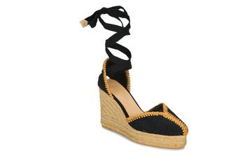 Espadrillas donna Castaner COEUR in colore nero, realizzate in tessuto di alta qualità, con suola in corda resistente e design elegante. Perfette per occasioni estive e look casual-chic, queste espadrillas offrono comfort e stile. Ideali per completare ogni outfit, da gonne a pantaloni, un must-have per il tuo guardaroba estivo.