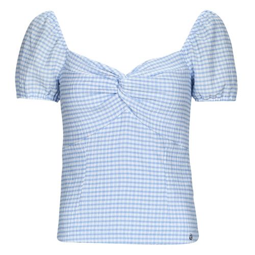 Camicetta Donna Guess SS LAZIZE KNOT TOP in Bianco, elegante top estivo con nodo, ideale per un look casual e alla moda. Perfetto da abbinare a jeans o gonne per un outfit versatile e chic. Acquista ora il tuo Guess SS LAZIZE KNOT TOP per un tocco di stile nel tuo guardaroba!