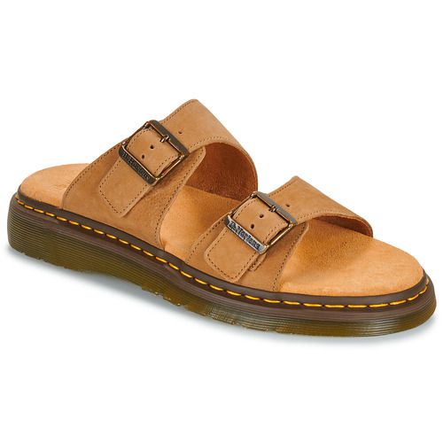 Ciabatta donna Dr. Martens Josef Savannah in nubuck tumbled color beige, modello elegante e versatile, ideale per ogni outfit. Perfette per la stagione primaverile ed estiva, queste ciabatte uniscono comfort e stile, realizzate con materiali di alta qualità per un look sofisticato.