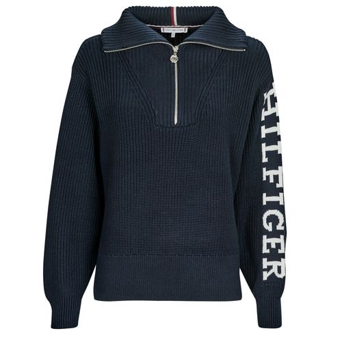 Maglione Donna Tommy Hilfiger PLACED HILFIGER 1/2 ZIP SWEATER Marine, elegante pullover con zip a metà, perfetto per un look casual e sofisticato. Realizzato in morbido materiale di alta qualità, disponibile nel classico colore marine, ideale per abbinamenti versatili. Ottimo per la stagione autunnale e invernale, questo maglione è un must-have nel guardaroba di ogni donna amante dello stile e del comfort. Acquista ora il tuo Tommy Hilfiger PLACED HILFIGER 1/2 ZIP SWEATER!