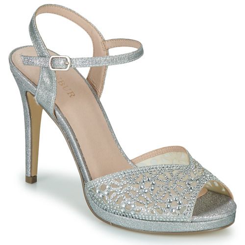 Sandali Donna Menbur CANIS MINOR in Argento, eleganti e alla moda, ideali per ogni occasione. Realizzati con materiali di alta qualità, offrono comfort e stile, perfetti per completare il tuo look estivo. Acquista ora i Sandali CANIS MINOR Argento e risplendi in ogni evento.