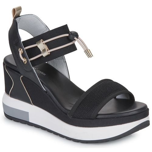 Sandali Donna NeroGiardini E307753D-100 in colore nero, realizzati con materiali di alta qualità. Design elegante e moderno, perfetti per ogni occasione. Comfort ottimale grazie alla suola ergonomica. Acquista ora i sandali NeroGiardini per un tocco di stile al tuo outfit estivo.