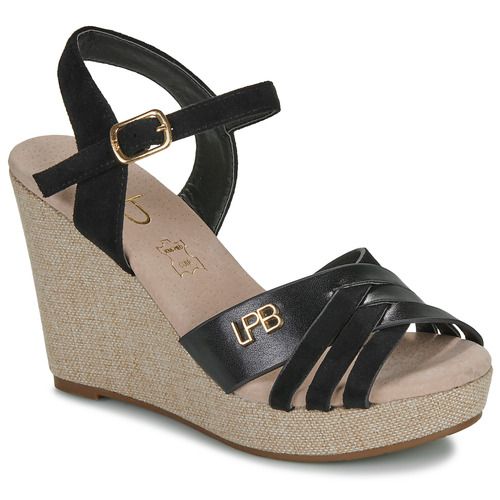Sandali donna Les Petites Bombes ISALINE in nero, eleganti e trendy, perfetti per ogni occasione. Scopri il comfort e lo stile di questi sandali, ideali per completare il tuo outfit estivo. Fashion, comodità e qualità per le donne che amano distinguersi.