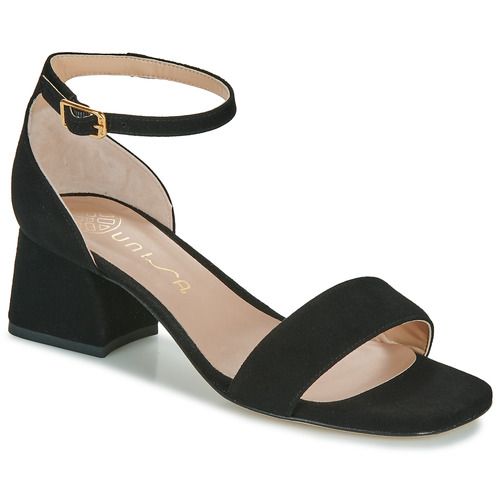 Sandali KANY Nero di Unisa per Donna: eleganti e versatili, ideali per ogni occasione. Realizzati con materiali di alta qualità, offrono comfort e stile, perfetti per completare il tuo look estivo. Acquista ora per aggiungere un tocco di classe al tuo guardaroba.