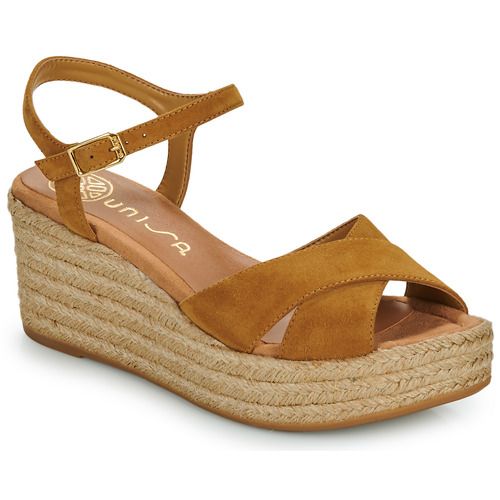 Sandali donna Unisa KIRA in marrone, eleganti e versatili, perfetti per ogni occasione. Design moderno con dettagli raffinati, ideali per completare il tuo look estivo. Scopri il comfort e lo stile senza tempo di questi sandali Unisa.