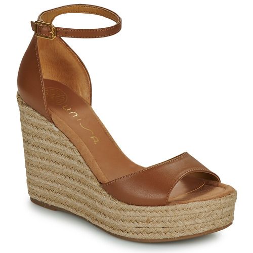 Sandali Unisa MIAMI Marrone da donna, eleganti e versatili, ideali per ogni occasione. Design moderno e comodo, realizzati con materiali di alta qualità per garantire stile e comfort. Perfetti per completare il tuo look estivo con classe. Acquista online ora per un tocco di moda sensazionale!