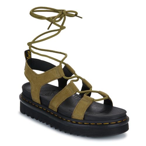 Sandali Donna Dr. Martens Nartilla Muted Olive Tumbled Nubuck Kaki, con un elegante design in nubuck di alta qualità e una tonalità verde oliva. Ideali per un look estivo trendy, questi sandali offrono comfort e stile, perfetti per ogni occasione casual. Acquista ora per un tocco di classe nel tuo guardaroba estivo!