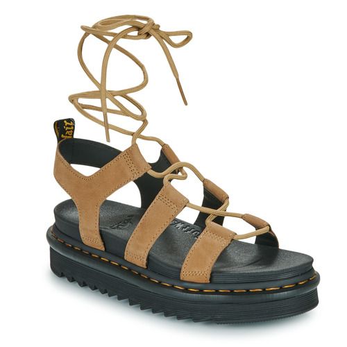 Sandali Donna Dr. Martens Nartilla Savannah Tan Tumbled Nubuck Beige, eleganti e comodi, perfetti per ogni occasione. Realizzati in nubuck di alta qualità, questi sandali offrono stile e comfort, ideali per la stagione estiva. Acquista ora i migliori sandali Dr. Martens per un look alla moda e versatile.