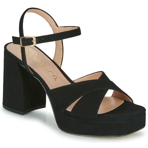 Sandali Unisa OZZY Nero per donna, eleganti e alla moda. Realizzati in materiale di alta qualità, questi sandali neri offrono comfort e stile per ogni occasione. Perfetti per l'estate, con un design versatile che li rende adatti a vari outfit. Acquista ora i sandali Unisa OZZY Nero per un look chic e sofisticato.