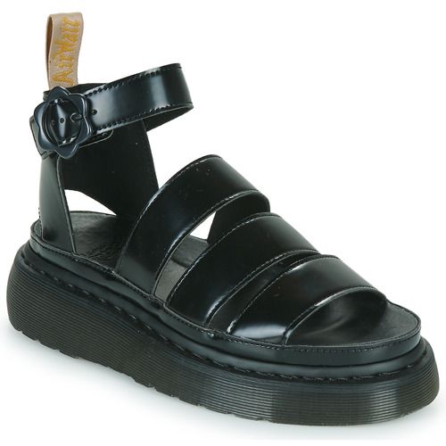 Sandali da donna Dr. Martens VEGAN CLARISSA BLACK OXFORD in nero, realizzati in materiale vegano resistente, con tacco quadrato per un comfort ottimale. Design elegante e versatile, perfetti per ogni occasione. Ideali per chi cerca stile senza compromessi.