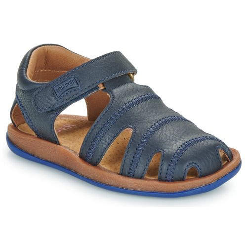 Sandali Camper BICHO per bambina in colore marine, ideali per la stagione estiva. Comodi e leggeri, questi sandali sono perfetti per le avventure quotidiane delle ragazzine. Dettagli di design moderno e materiali di alta qualità offrono comfort e stile. Disponibili in vari numeri, questi sandali rappresentano un'ottima scelta per le mamme che cercano praticità e moda. Acquista ora i sandali Camper BICHO marine per aggiungere un tocco di freschezza al guardaroba estivo della tua bimba!