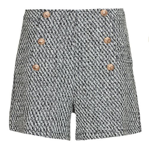 Shorts donna Moony Mood OLDYN in grigio, realizzati in tessuto leggero e traspirante. Design moderno e versatile, perfetti per ogni occasione estiva. Ideali da abbinare a t-shirt o bluse per un look casual e alla moda. Disponibili in varie taglie, questi shorts offrono comfort e stile per ogni giorno.