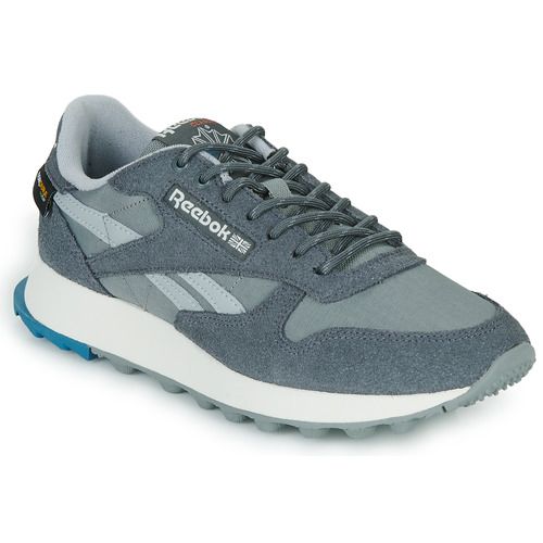 Sneakers basse Reebok Classic CLASSIC LEATHER Grigio per donna, eleganti e versatili, perfette per completare ogni outfit. Caratterizzate da un design classico e un comfort eccezionale, queste scarpe sono ideali per la vita quotidiana e per il tempo libero. Scopri lo stile intramontabile delle Reebok Classic, un must-have per ogni appassionata di moda.