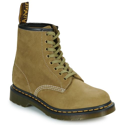 Stivaletti Donna Dr. Martens 1460 Muted Olive Nubuck Kaki, realizzati in suede tumbled, con una finitura elegante e resistente. Perfetti per ogni occasione, questi stivaletti offrono comfort e stile. Acquista ora per aggiungere un tocco di moda al tuo guardaroba con i classici Dr. Martens.