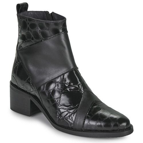 Stivaletti Donna Otess / Zoï 14880 Nero, stivaletti eleganti e comodi, realizzati in materiali di alta qualità. Perfetti per ogni occasione, offrono stile e versatilità per completare il tuo outfit. Scarpe ideali per l'autunno e l'inverno, con cinturino decorativo e suola antiscivolo. Acquista ora per un look chic e contemporaneo.