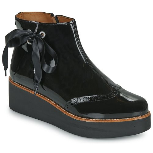 Stivaletti Donna Fericelli JANDICI in Nero, eleganti e alla moda, perfetti per ogni occasione. Realizzati con materiali di alta qualità, offrono comfort e stile. Ideali per completare il tuo look autunnale e invernale, questi stivaletti sono un must-have nel tuo armadio.
