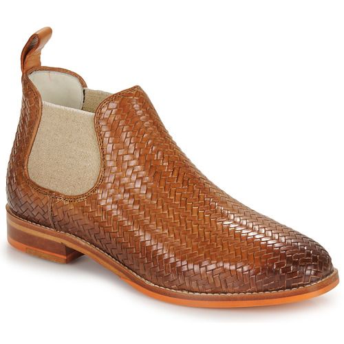 Stivaletti donna Melvin & Hamilton KATRIN 7 marrone, realizzati in pelle di alta qualità, dal design elegante e alla moda. Questi stivaletti presentano un tacco basso, dettagli raffinati e una vestibilità comoda, ideali per ogni occasione. Perfetti per completare outfit casual o più sofisticati, sono un must-have per le fashioniste. Acquista ora gli stivaletti Melvin & Hamilton KATRIN 7 per un look chic e senza tempo.
