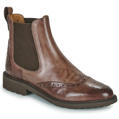 Stivaletti Melvin & Hamilton SELINA 29 Marrone per donna, realizzati in pelle di alta qualità, con design elegante e comodo. Ideali per ogni occasione, questi stivaletti offrono un look sofisticato e alla moda. Perfetti da abbinare con outfit casual o formali. Disponibili ora per un acquisto facile e veloce.