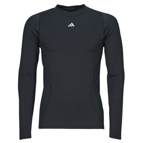 T-shirt a maniche lunghe per uomo adidas TF CR LS TEE M in nero, ideale per comfort e stile, perfetta per attività sportive e casual. Scopri un design moderno e versatile, realizzata con materiali di alta qualità, per garantirti un'impareggiabile vestibilità. Perfetta per ogni occasione, questa T-shirt adidas è un must-have nel tuo guardaroba.